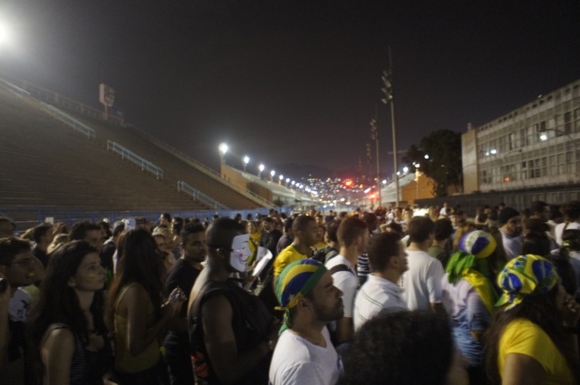 Demonstrators pass by the Sambadrome on Avenida Presidente Vargas on June 20